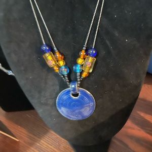 Vintage Double Strand Medallion. Beautiful unique beads.